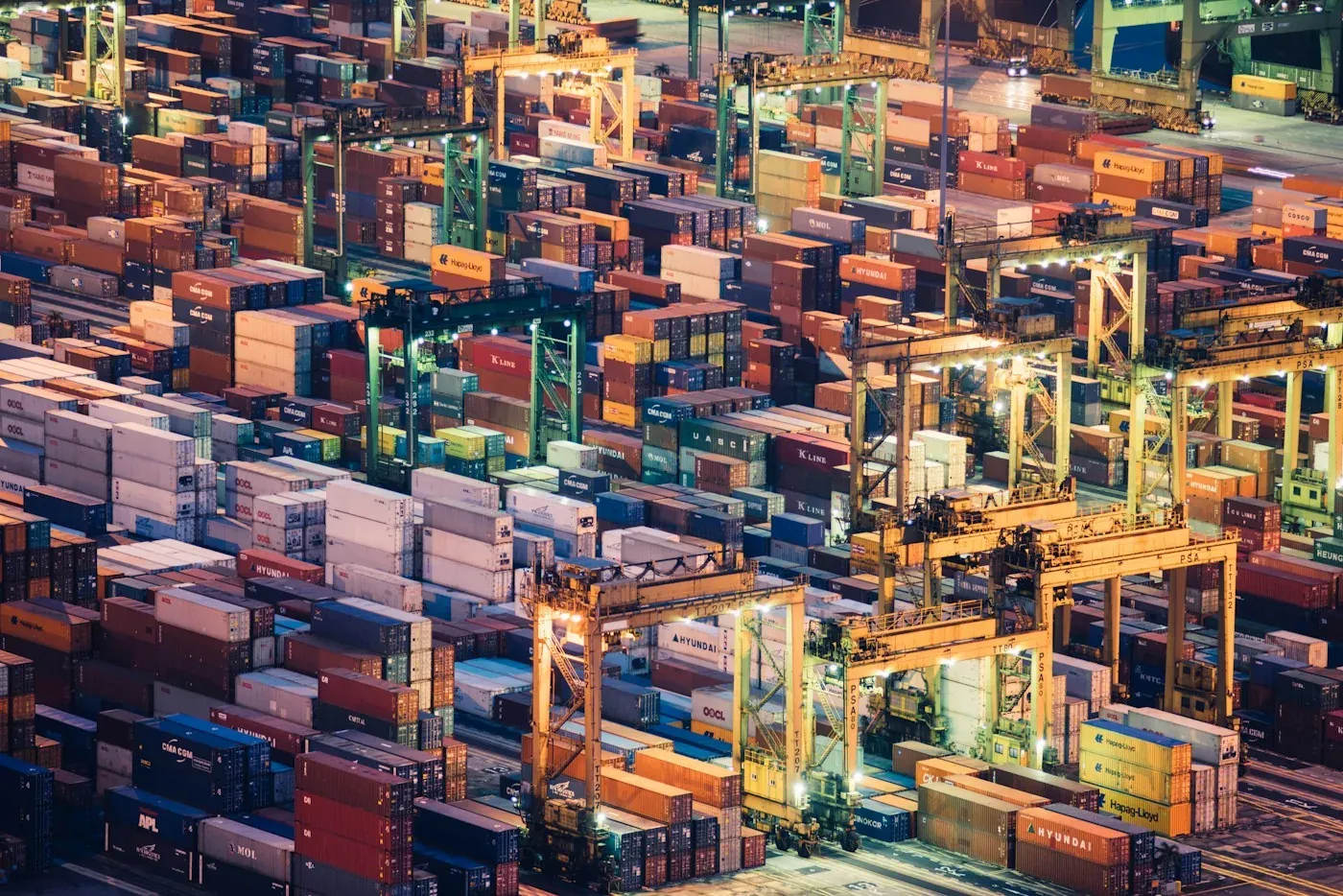 Aerial photograph of shipping containers and cargo infrastructure at a port