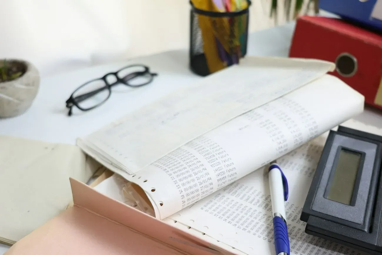 Documents and a calculator arranged for review