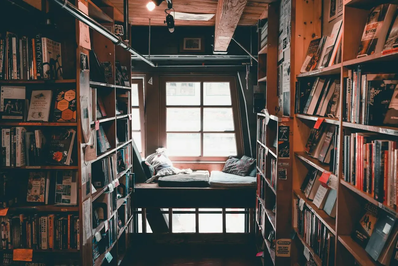 Daylit bookshop with shelves and seating