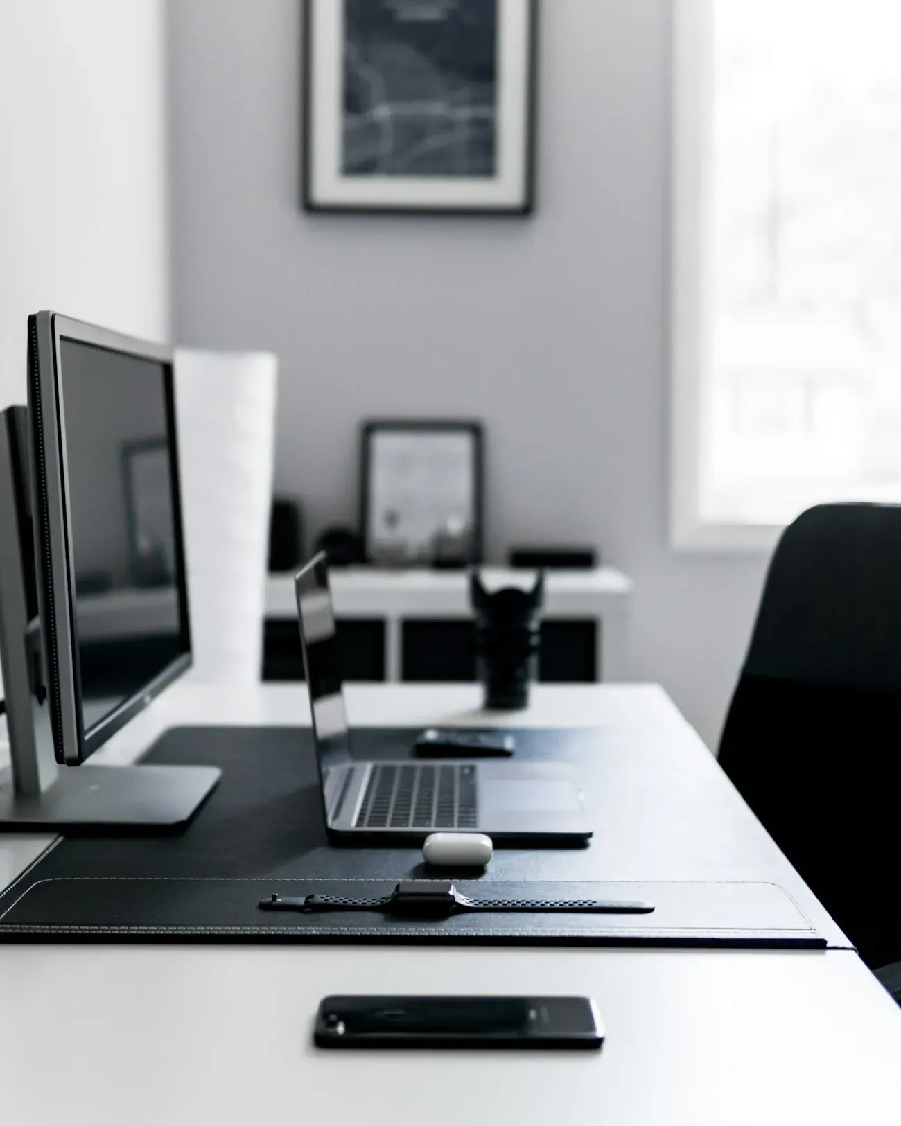 Laptop and monitor in a workspace